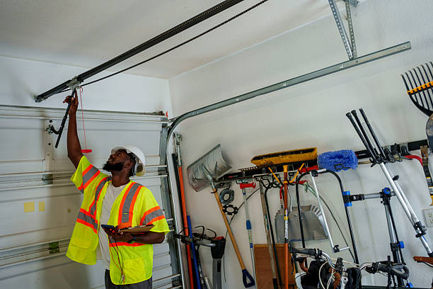 Professional Garage Door Panel Replacement technician working in West Middlesex, PA